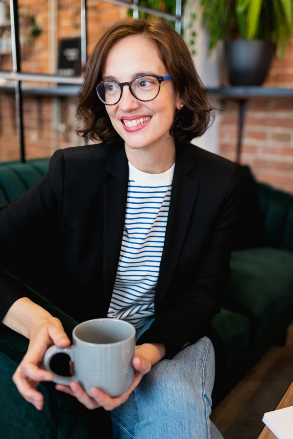 Itziar Lanas Rodriguez, watercolor artist, with her hand-painted artwork