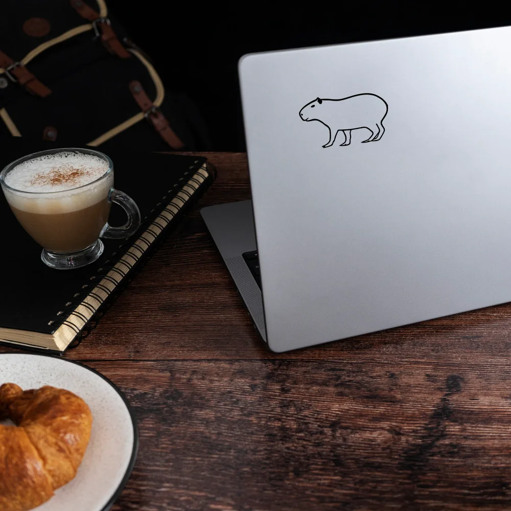 Capybara vinyl decal contour on computer