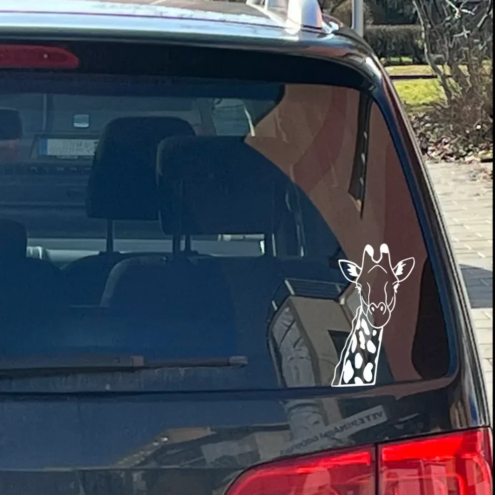 Handcrafted giraffe vinyl decal on car window