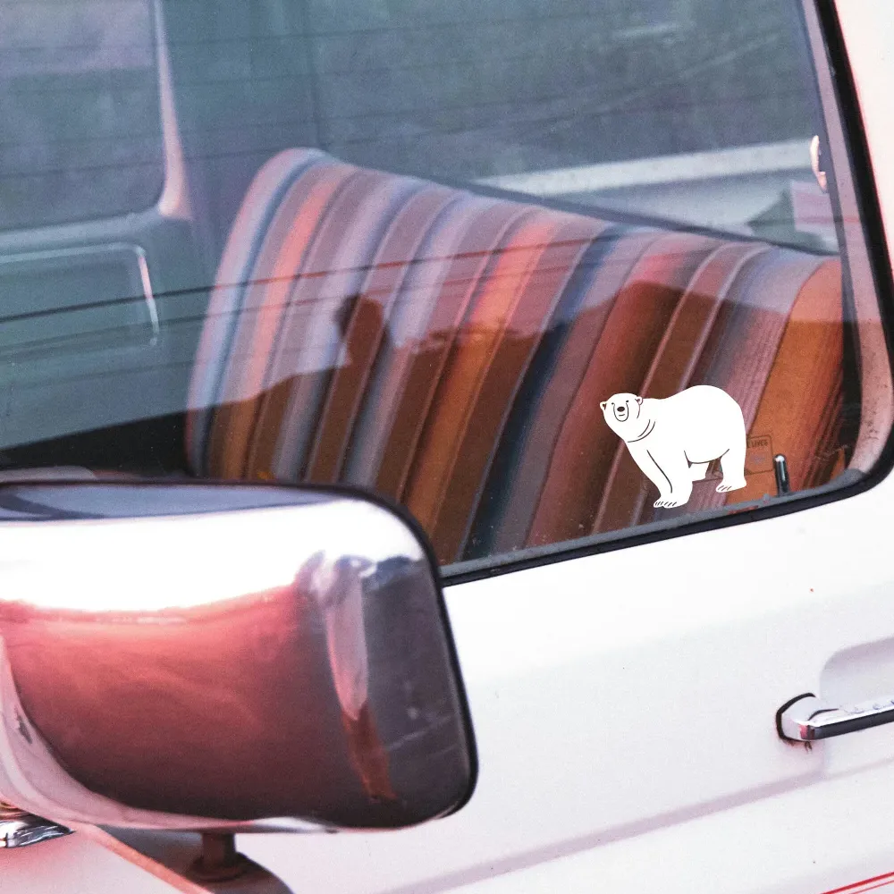 Handcrafted polar bear vinyl decal on car window
