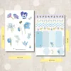 Blue Botanical Paper Sticker Set with watercolor flowers and label designs on two sheets